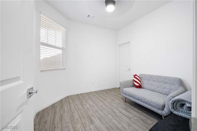 3447 Covilha Ln, Henderson, NV 89044 - living area featuring light wood finished floors and ceiling fan