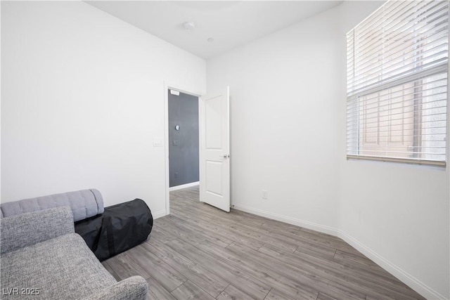 3447 Covilha Ln, Henderson, NV 89044 - living area featuring wood finished floors and healthy amount of natural light