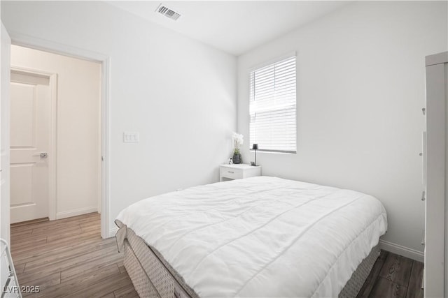 3447 Covilha Ln, Henderson, NV 89044 - bedroom with wood finished floors