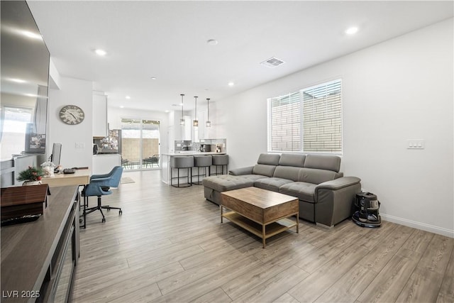 3447 Covilha Ln, Henderson, NV 89044 - living room featuring light wood-style floors, recessed lighting, and an office area