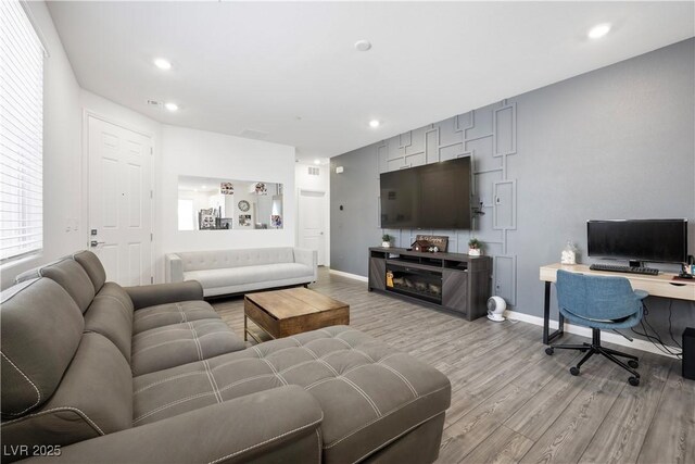 3447 Covilha Ln, Henderson, NV 89044 - living area featuring light wood-type flooring, recessed lighting, and an office area