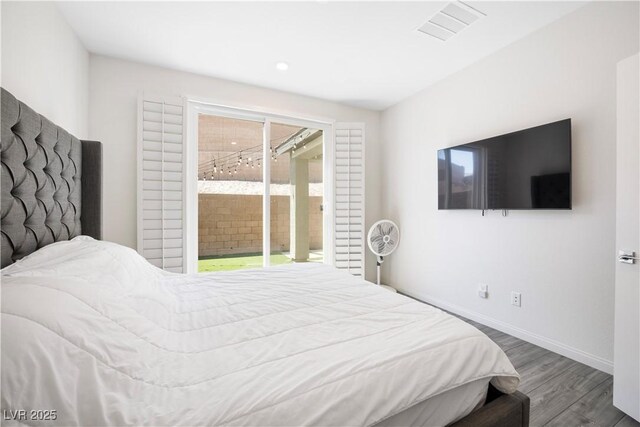 3447 Covilha Ln, Henderson, NV 89044 - bedroom with wood finished floors and access to outside