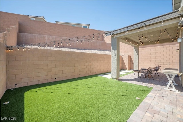 3447 Covilha Ln, Henderson, NV 89044 - fenced backyard featuring a patio