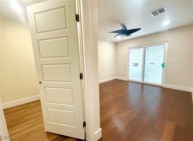 612 Brush St, Las Vegas, NV 89107 - spare room with wood finished floors and a ceiling fan