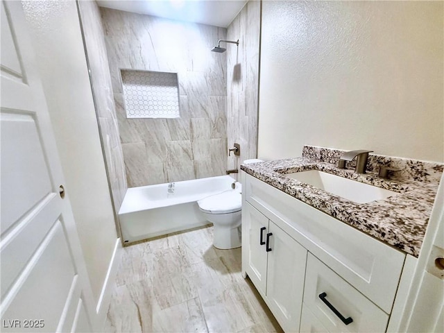 612 Brush St, Las Vegas, NV 89107 - bathroom featuring vanity, tub / shower combination, and marble look tile flooring