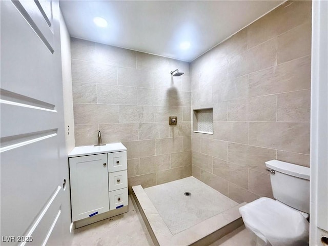 612 Brush St, Las Vegas, NV 89107 - full bath with a tile shower, tile walls, and vanity