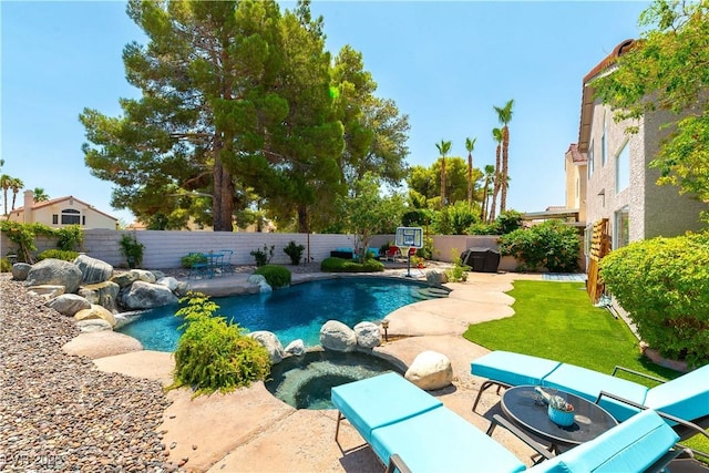 3024 Pier Harbor Dr, Las Vegas, NV 89117 - view of pool featuring a patio, a fenced backyard, and a pool with connected hot tub