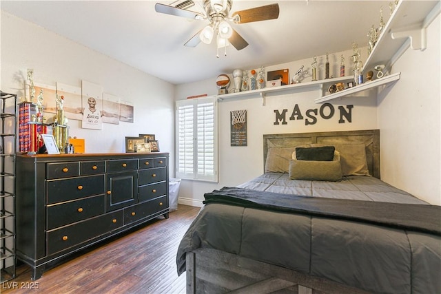 3024 Pier Harbor Dr, Las Vegas, NV 89117 - bedroom with dark wood-type flooring and ceiling fan
