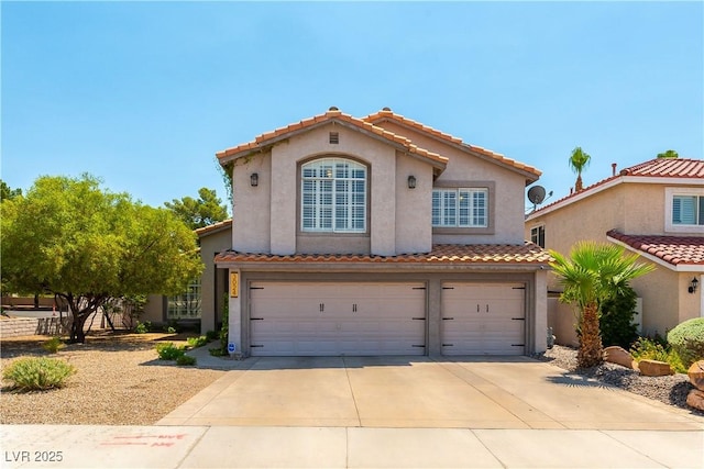 3024 Pier Harbor Dr, Las Vegas, NV 89117 - mediterranean / spanish house featuring a garage, driveway, stucco siding, and a tile roof
