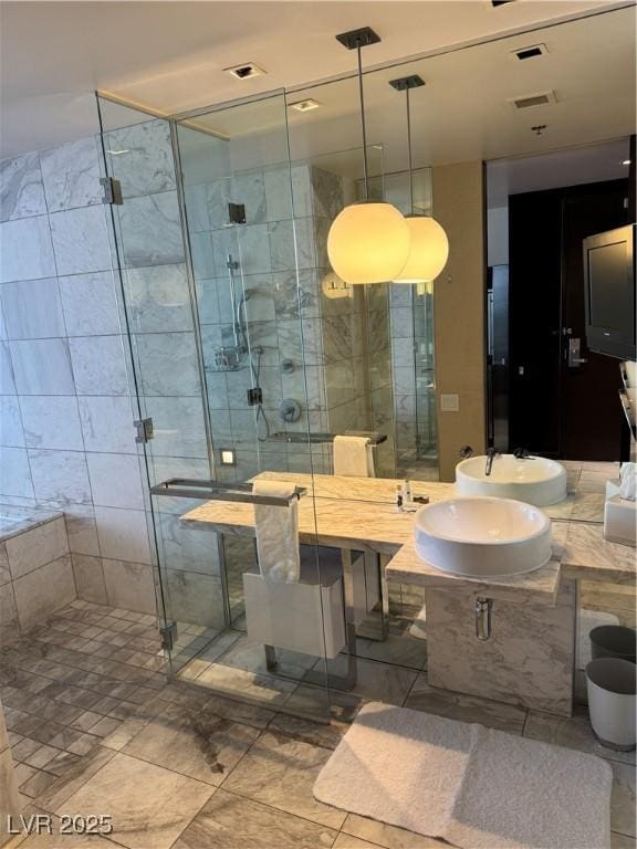 4381 W Flamingo Rd Unit 3708, Las Vegas, NV 89103 - full bathroom featuring a stall shower and a sink