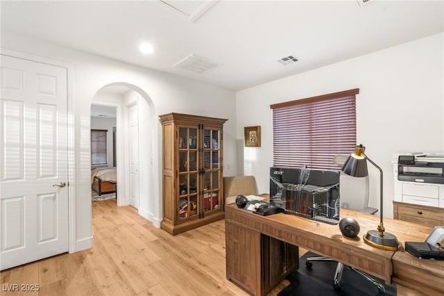 2310 Malaga Peak St, Las Vegas, NV 89135 - office area with arched walkways, light wood-style flooring, and recessed lighting
