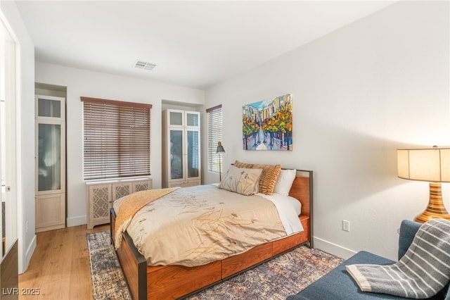 2310 Malaga Peak St, Las Vegas, NV 89135 - bedroom featuring baseboards and wood finished floors