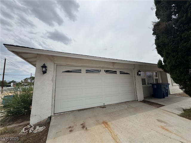 2583 Emerald Ave, Las Vegas, NV 89120 - garage featuring concrete driveway