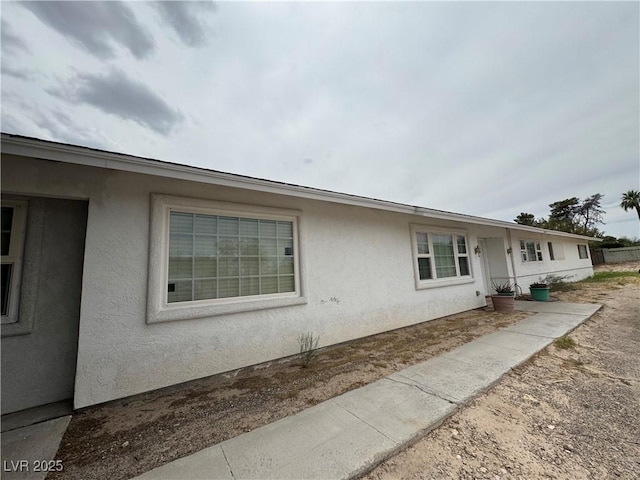 2583 Emerald Ave, Las Vegas, NV 89120 - view of side of home with stucco siding