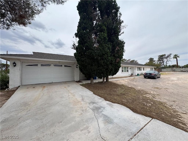 2583 Emerald Ave, Las Vegas, NV 89120 - view of front of property featuring driveway and stucco siding