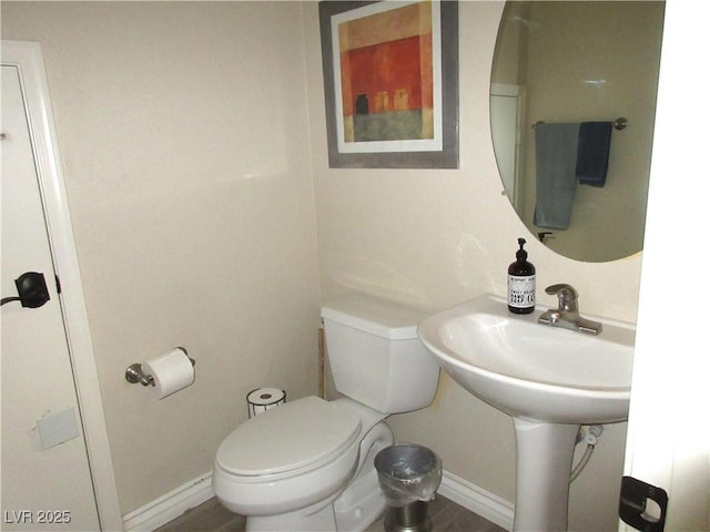 10013 Solid Lime St, Las Vegas, NV 89183 - bathroom featuring toilet and baseboards