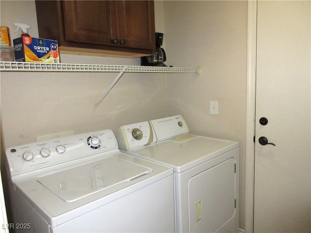 10013 Solid Lime St, Las Vegas, NV 89183 - laundry room with washer and clothes dryer and cabinet space