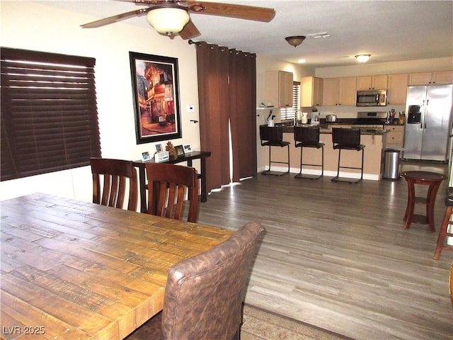 10013 Solid Lime St, Las Vegas, NV 89183 - dining area featuring a ceiling fan and wood finished floors