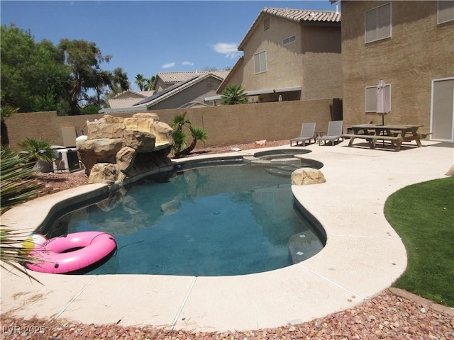10013 Solid Lime St, Las Vegas, NV 89183 - view of swimming pool with a patio area and a pool with connected hot tub