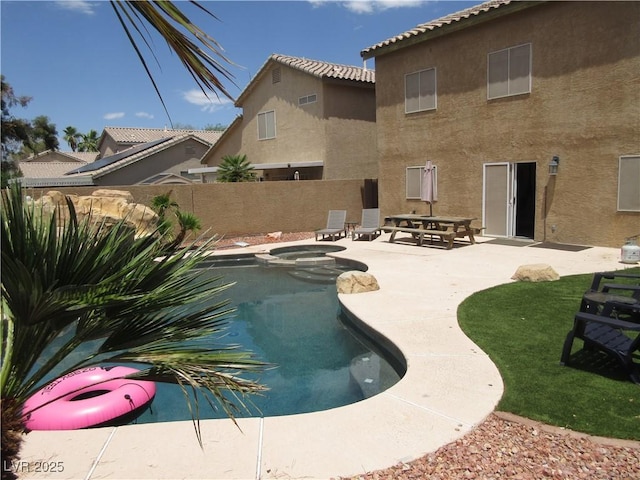 10013 Solid Lime St, Las Vegas, NV 89183 - view of pool with a patio area and a pool with connected hot tub