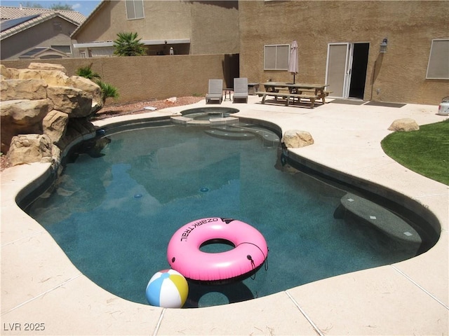 10013 Solid Lime St, Las Vegas, NV 89183 - view of pool with a patio and a pool with connected hot tub
