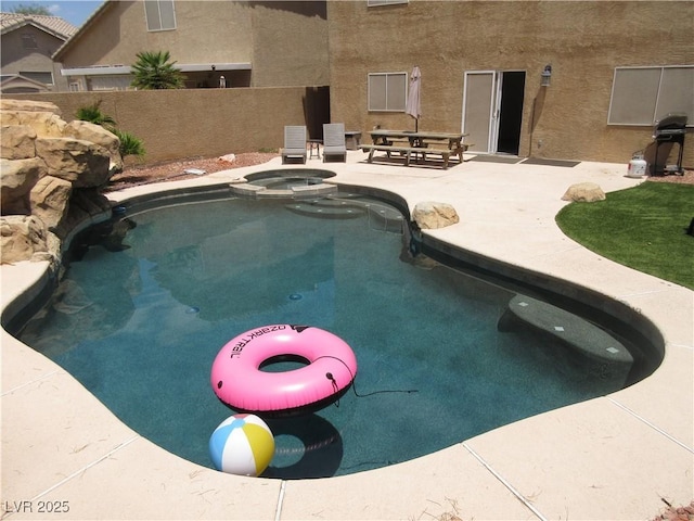 10013 Solid Lime St, Las Vegas, NV 89183 - view of pool featuring a patio, a pool with connected hot tub, and area for grilling