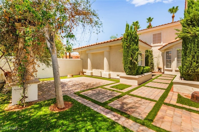 1800 Aztec Cliffs Ct, Las Vegas, NV 89128 - view of yard with a patio