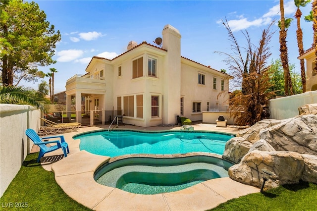 1800 Aztec Cliffs Ct, Las Vegas, NV 89128 - view of swimming pool featuring a patio area and a pool with connected hot tub