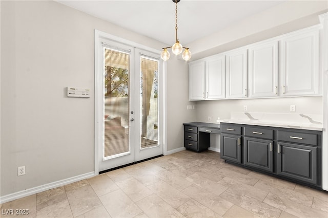 1800 Aztec Cliffs Ct, Las Vegas, NV 89128 - interior space with white cabinets, french doors, hanging light fixtures, and light countertops