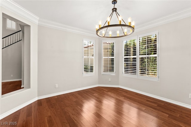 1800 Aztec Cliffs Ct, Las Vegas, NV 89128 - empty room with a chandelier, crown molding, and wood finished floors