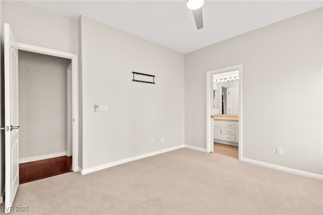 1800 Aztec Cliffs Ct, Las Vegas, NV 89128 - unfurnished bedroom with light colored carpet, ensuite bathroom, and ceiling fan