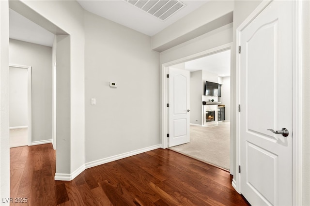 1800 Aztec Cliffs Ct, Las Vegas, NV 89128 - corridor featuring wood finished floors and baseboards