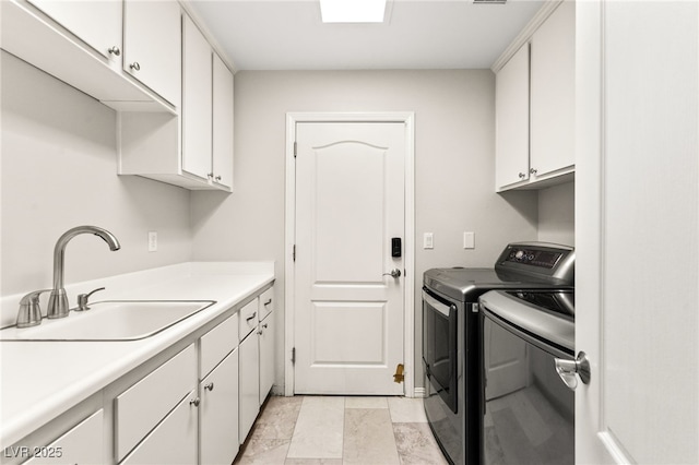 1800 Aztec Cliffs Ct, Las Vegas, NV 89128 - laundry room featuring cabinet space and washer and clothes dryer