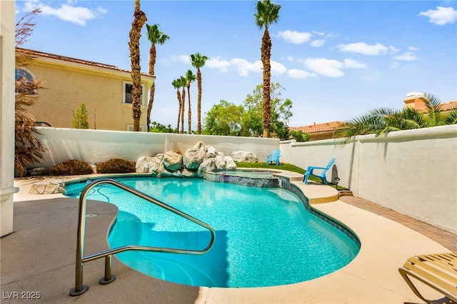 1800 Aztec Cliffs Ct, Las Vegas, NV 89128 - view of swimming pool with a fenced backyard, a pool with connected hot tub, and a patio