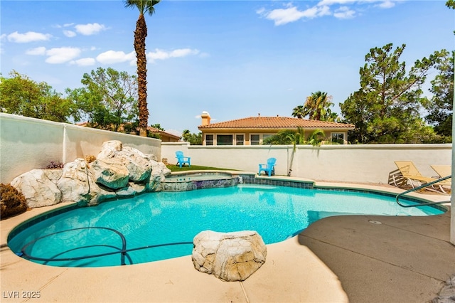 1800 Aztec Cliffs Ct, Las Vegas, NV 89128 - view of swimming pool featuring a pool with connected hot tub and a patio