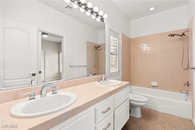 1800 Aztec Cliffs Ct, Las Vegas, NV 89128 - bathroom featuring double vanity, tub / shower combination, and tile patterned floors
