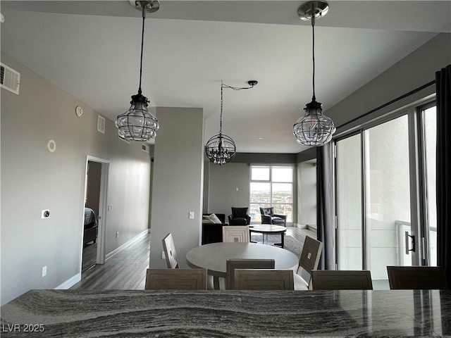 150 Las Vegas Blvd Unit 1115, Las Vegas, NV 89101 - dining area with wood finished floors and baseboards
