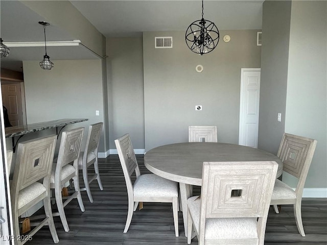 150 Las Vegas Blvd Unit 1115, Las Vegas, NV 89101 - dining space with wood finished floors and a chandelier