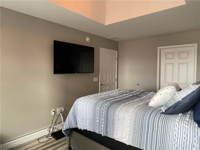 150 Las Vegas Blvd Unit 1115, Las Vegas, NV 89101 - bedroom with wood finished floors and baseboards