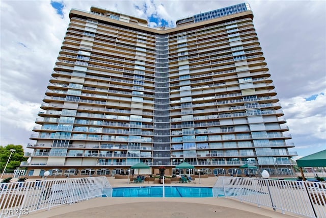 3111 Bel Air Dr Unit 9E, Las Vegas, NV 89109 - community pool featuring a patio area