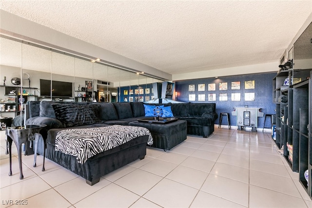 3111 Bel Air Dr Unit 9E, Las Vegas, NV 89109 - living room with tile patterned flooring and a textured ceiling