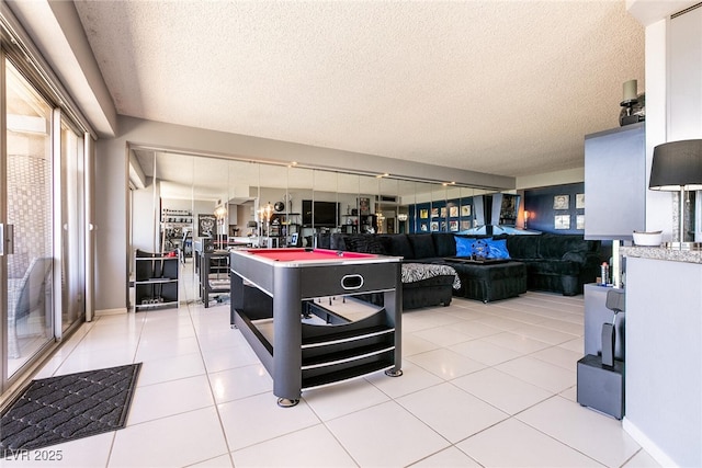 3111 Bel Air Dr Unit 9E, Las Vegas, NV 89109 - interior space featuring a textured ceiling and light tile patterned flooring