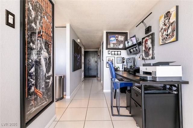 3111 Bel Air Dr Unit 9E, Las Vegas, NV 89109 - hall with light tile patterned floors and a textured ceiling