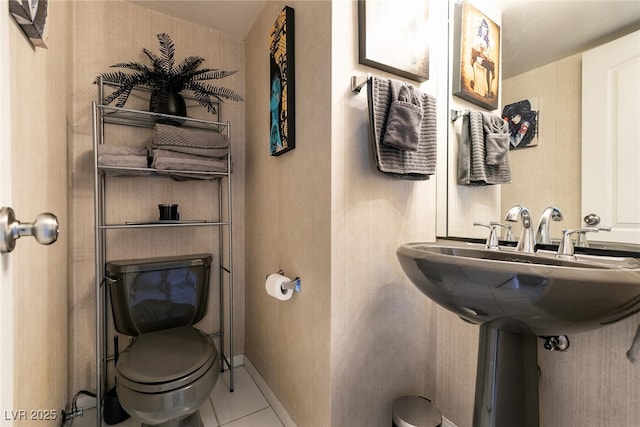 3111 Bel Air Dr Unit 9E, Las Vegas, NV 89109 - bathroom featuring toilet and tile patterned floors