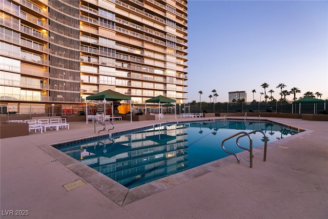 3111 Bel Air Dr Unit 9E, Las Vegas, NV 89109 - community pool with a patio