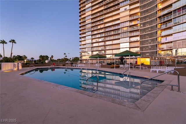 3111 Bel Air Dr Unit 9E, Las Vegas, NV 89109 - community pool with a patio area