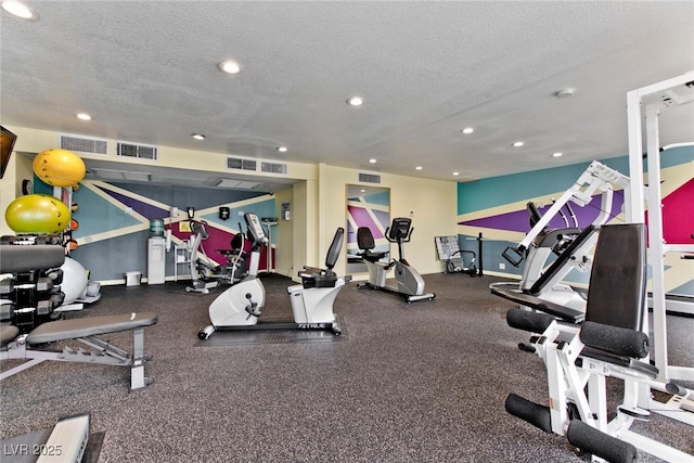 3111 Bel Air Dr Unit 9E, Las Vegas, NV 89109 - gym with a textured ceiling and recessed lighting