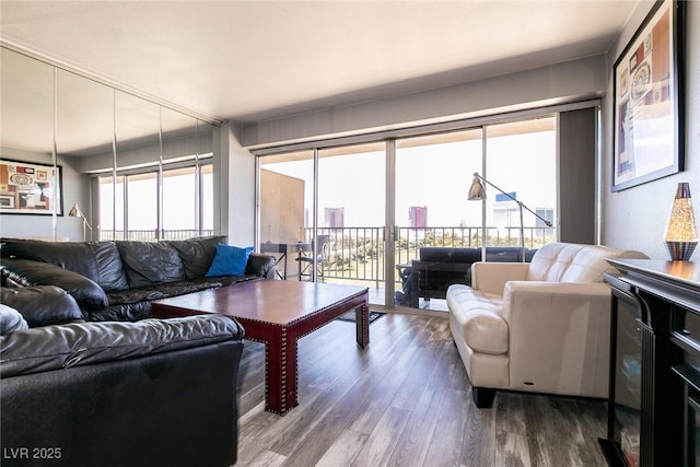 3111 Bel Air Dr Unit 9E, Las Vegas, NV 89109 - living area with wood finished floors and plenty of natural light