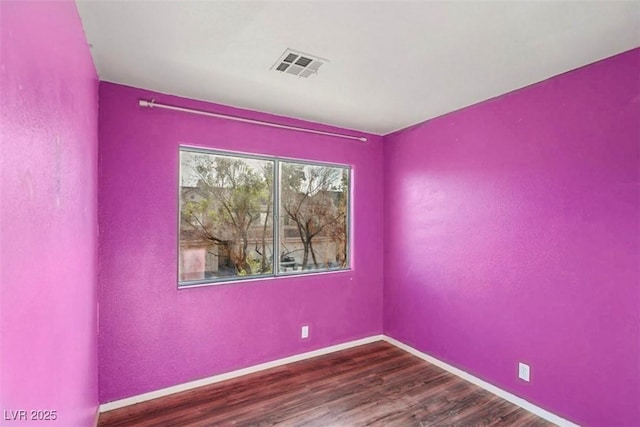 3336 Cheyenne Gardens Way N, Las Vegas, NV 89032 - unfurnished room with wood finished floors and baseboards