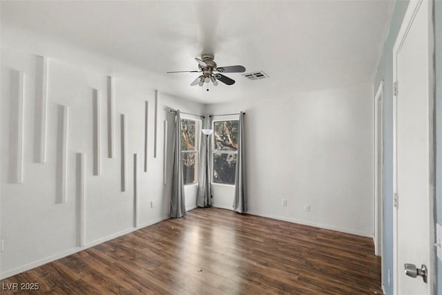3336 Cheyenne Gardens Way N, Las Vegas, NV 89032 - unfurnished bedroom with dark wood finished floors and a ceiling fan